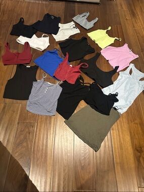 Set of 18 tank tops and sports bras. Various brands, various sizes.